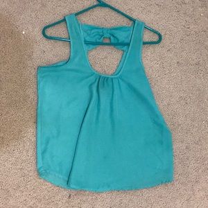 Light blue tank top.